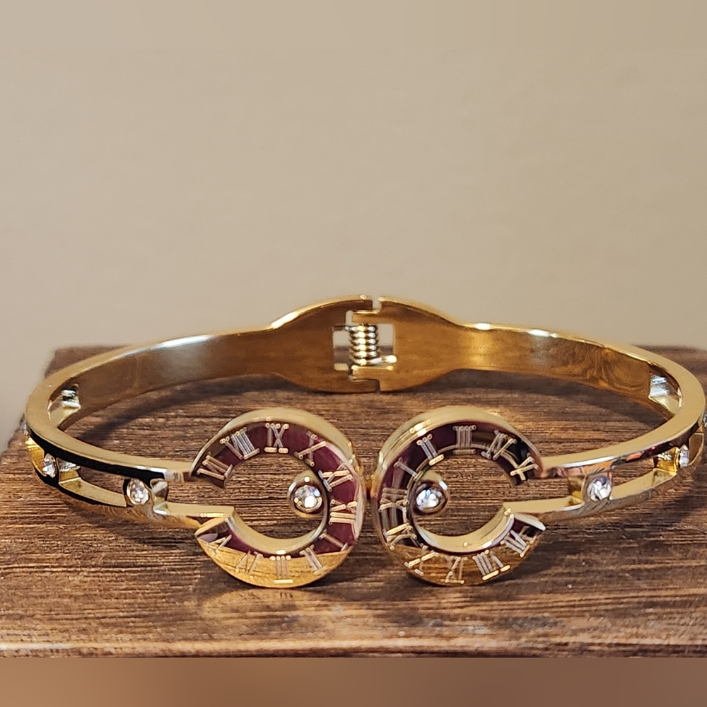 Gold Tone Women’s Spiral Accent Bracelet with Crystal Details - Picture 2 of 4
